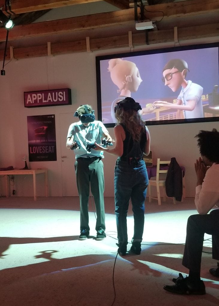 Intimate scenes work better in VR than in the real play. This may change quickly enough with advances in XR technology, though. © Double Eye Studios